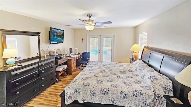 bedroom with hardwood / wood-style flooring, access to outside, french doors, and ceiling fan