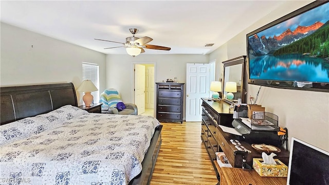 bedroom featuring ceiling fan and light wood-type flooring