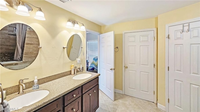 bathroom featuring vanity and tile patterned floors