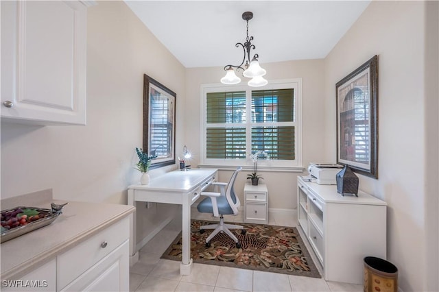 office space featuring light tile patterned floors and baseboards