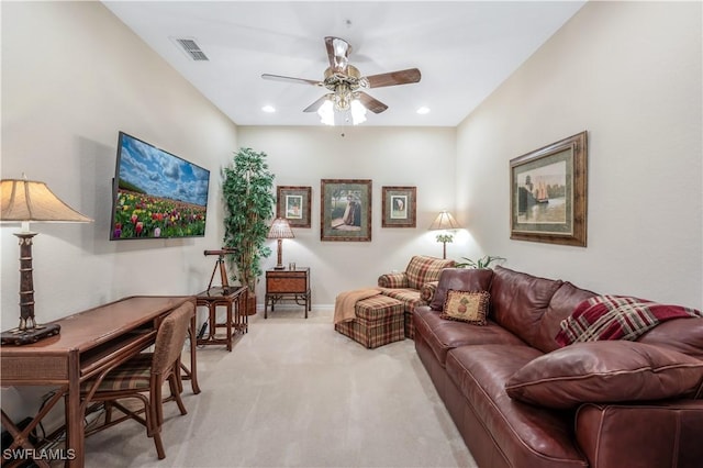 living room featuring ceiling fan, recessed lighting, light carpet, visible vents, and baseboards