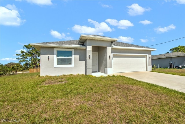 view of front facade with a front yard, roof with shingles, stucco siding, driveway, and an attached garage