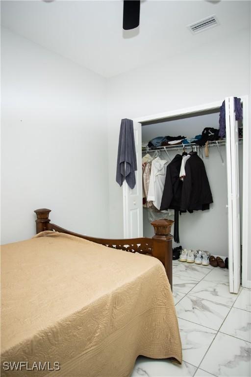 bedroom featuring ceiling fan