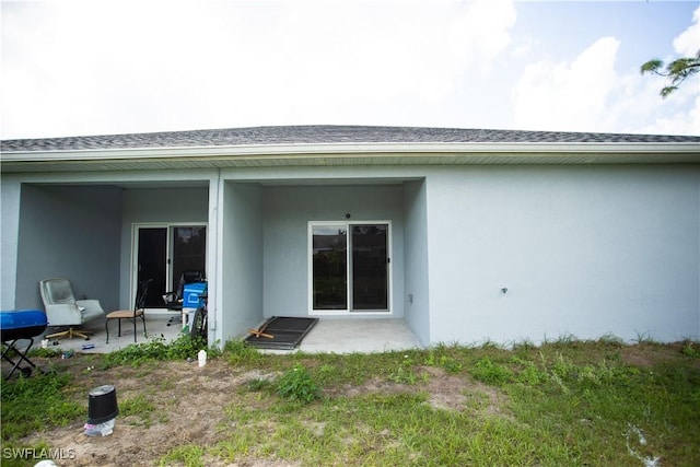 back of house featuring a patio