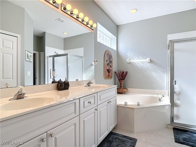 bathroom featuring tile patterned floors, vanity, and independent shower and bath