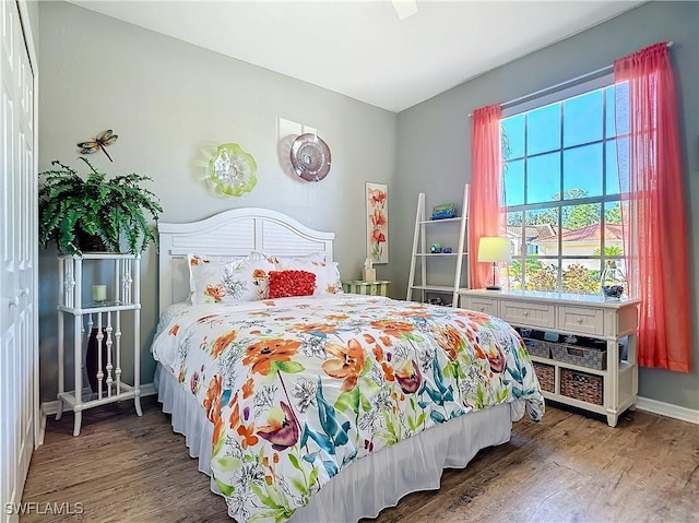 bedroom with wood-type flooring