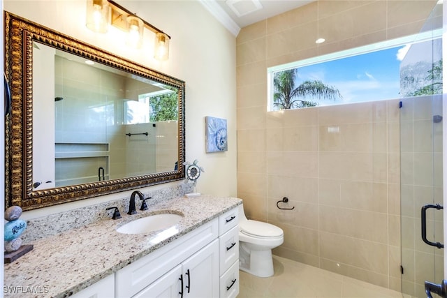 bathroom featuring walk in shower, vanity, and toilet