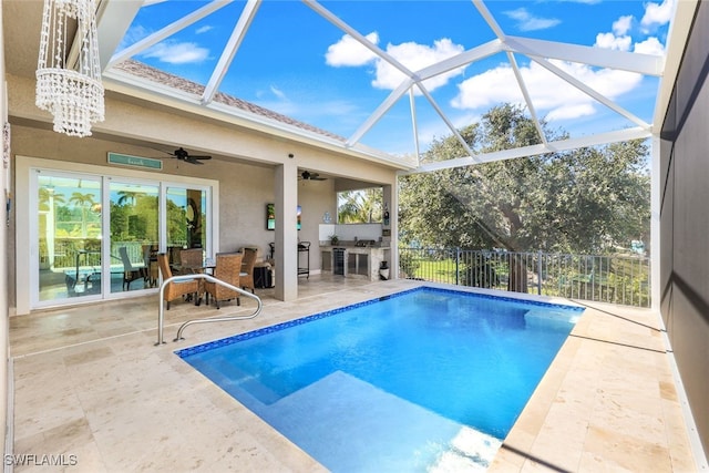 view of pool featuring ceiling fan, area for grilling, a lanai, and a patio