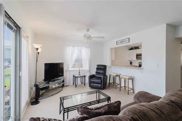 living room with ceiling fan