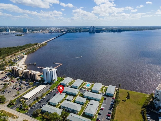 drone / aerial view with a water view