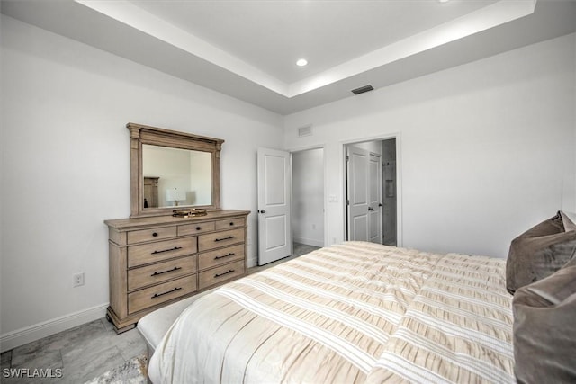 bedroom featuring a tray ceiling