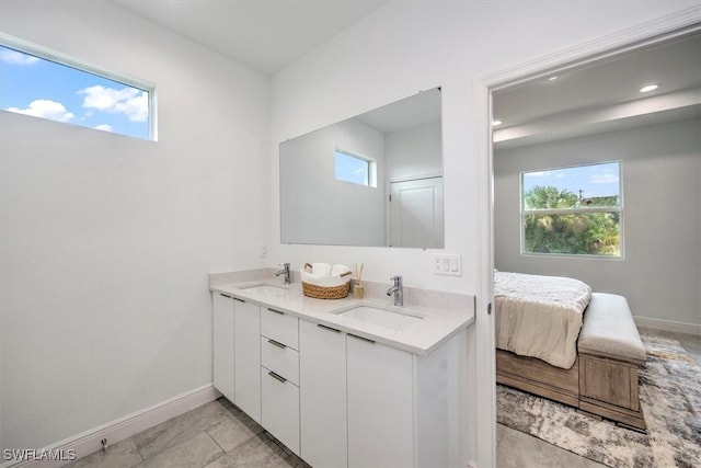 bathroom with vanity and tile patterned floors