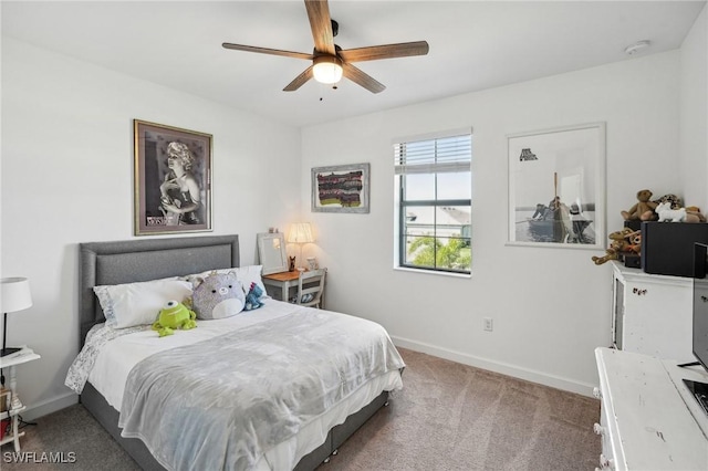 bedroom featuring carpet flooring, a ceiling fan, and baseboards