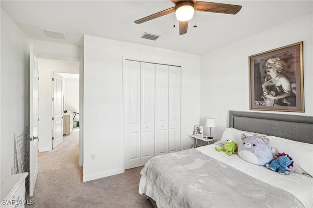 bedroom featuring visible vents, a closet, carpet, baseboards, and ceiling fan