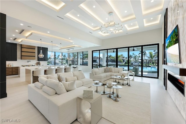 living area featuring light tile patterned floors, recessed lighting, a high ceiling, coffered ceiling, and visible vents