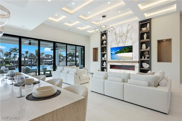 5346 Baypoint Ct, Cape Coral, FL 33904 - living area with light tile patterned floors, coffered ceiling, built in features, beamed ceiling, and a high end fireplace