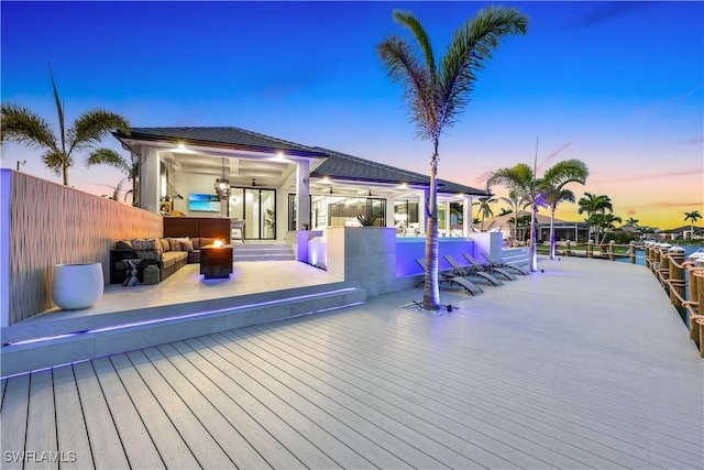 5346 Baypoint Ct, Cape Coral, FL 33904 - dock with an outdoor hangout area and a wooden deck