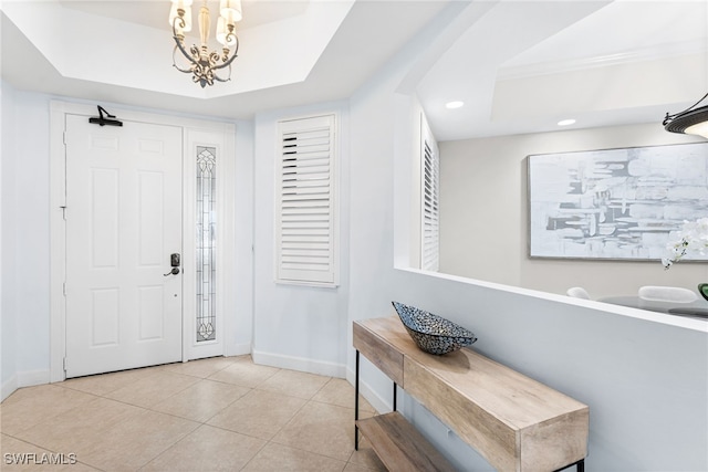 11600 Court Of Palms Unit 606, Fort Myers, FL 33908 - entrance foyer with a raised ceiling, recessed lighting, tile patterned flooring, and a chandelier