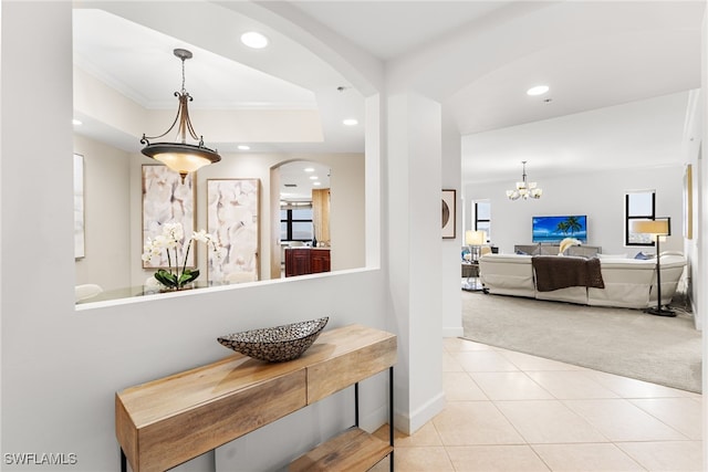 11600 Court Of Palms Unit 606, Fort Myers, FL 33908 - hall featuring carpet, arched walkways, recessed lighting, ornamental molding, and tile patterned flooring