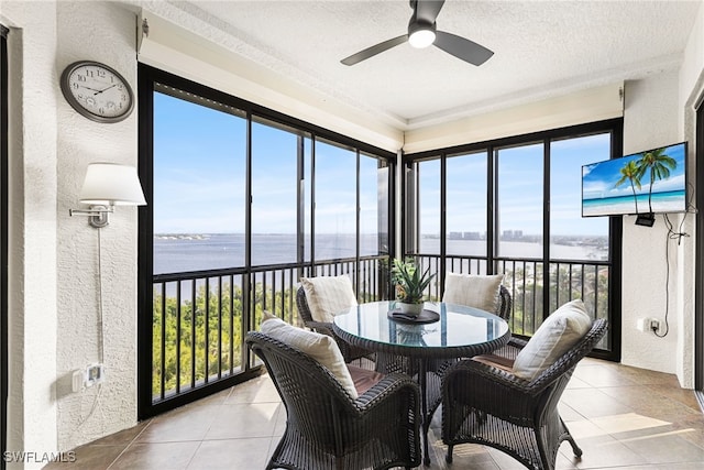 11600 Court Of Palms Unit 606, Fort Myers, FL 33908 - sunroom featuring a textured wall, tile patterned flooring, and a textured ceiling