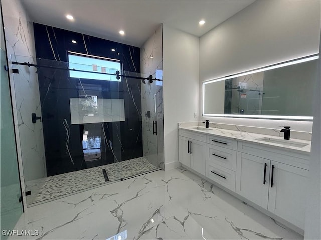 bathroom with marble finish floor, double vanity, a sink, and a marble finish shower