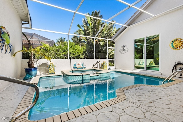 view of swimming pool with a patio, a lanai, and a pool with connected hot tub