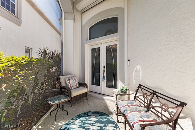 view of patio featuring french doors