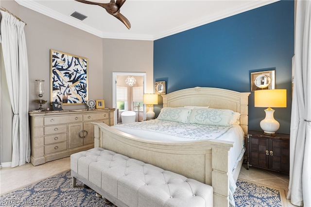 bedroom with ceiling fan, visible vents, crown molding, and tile patterned floors