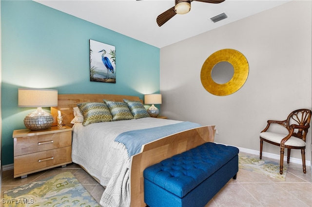 bedroom featuring a ceiling fan, tile patterned flooring, visible vents, and baseboards