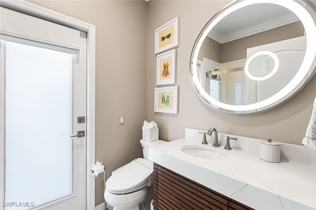 full bathroom with a shower with door, crown molding, vanity, and toilet