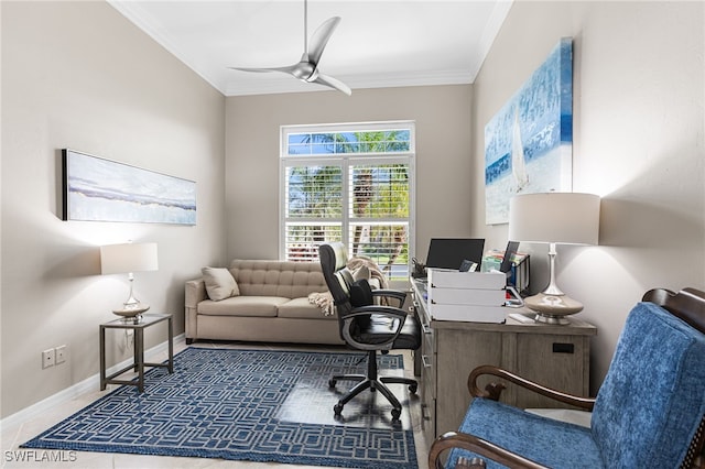 office featuring a ceiling fan, crown molding, and baseboards