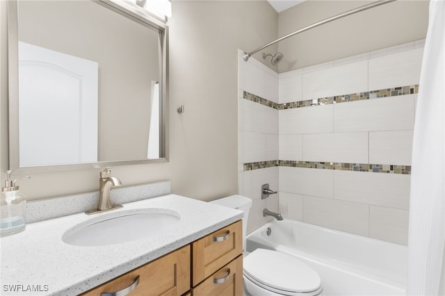 full bathroom featuring shower / bathtub combination with curtain, vanity, and toilet