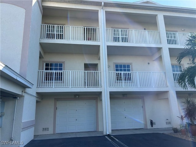 view of building exterior featuring a garage