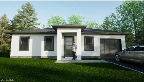 view of front facade with a front lawn, an attached garage, and stucco siding