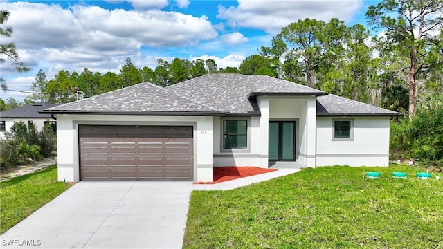 view of front of home featuring a garage, concrete driveway, a front lawn, and stucco siding