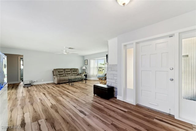 2084 Coral Point Dr, Cape Coral, FL 33990 - entryway with light wood-style floors, baseboards, and a ceiling fan