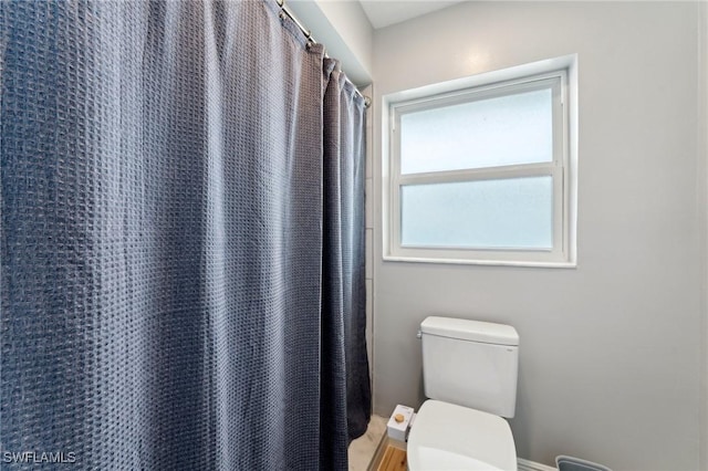 2084 Coral Point Dr, Cape Coral, FL 33990 - full bathroom featuring toilet and a shower with shower curtain