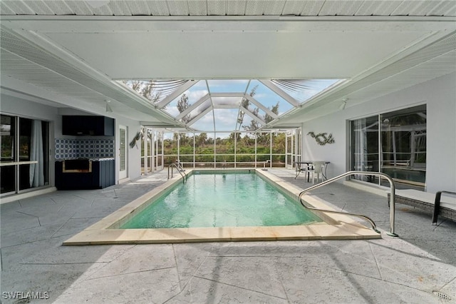 2084 Coral Point Dr, Cape Coral, FL 33990 - pool with glass enclosure and a patio