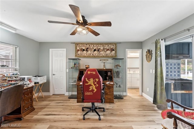 2084 Coral Point Dr, Cape Coral, FL 33990 - office with baseboards, a ceiling fan, and wood finished floors