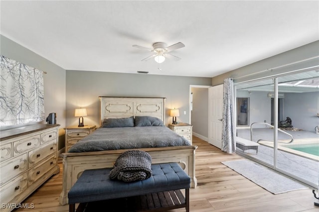2084 Coral Point Dr, Cape Coral, FL 33990 - bedroom with baseboards, light wood finished floors, access to exterior, and a ceiling fan