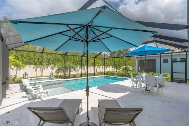 view of swimming pool featuring a lanai and a patio