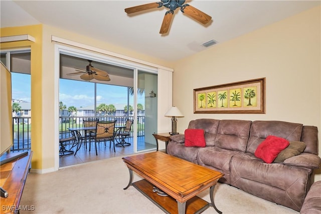 living room featuring ceiling fan