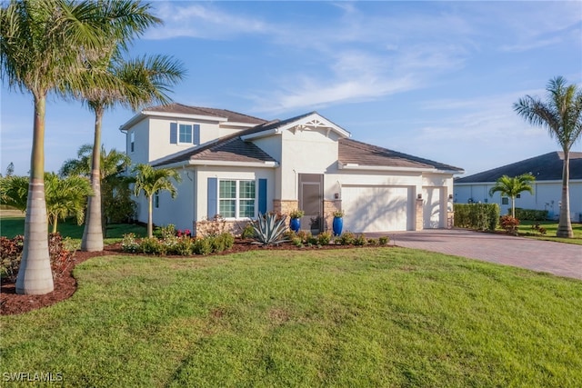 view of front of house with an attached garage, stucco siding, decorative driveway, and a front yard