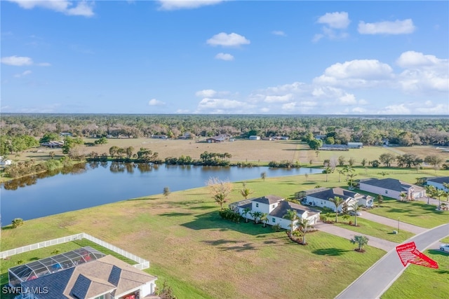 birds eye view of property with a rural view and a water view