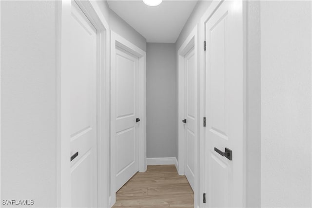 hallway featuring light hardwood / wood-style floors