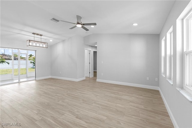 empty room featuring light wood finished floors, baseboards, recessed lighting, visible vents, and ceiling fan