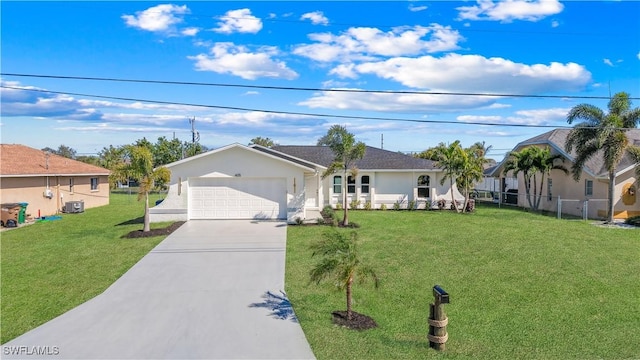 ranch-style home featuring a front yard, concrete driveway, fence, and central air condition unit