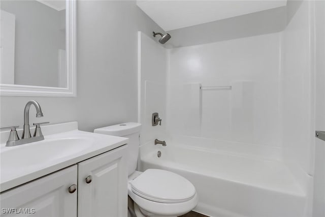 full bathroom featuring vanity, shower / bathing tub combination, and toilet