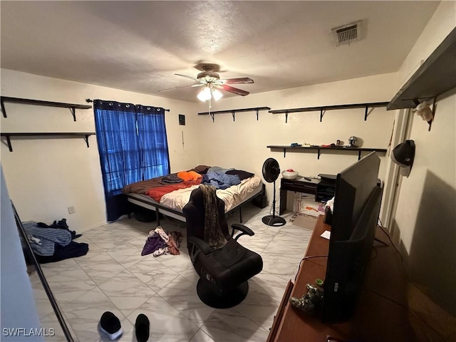 bedroom featuring visible vents, marble finish floor, and a ceiling fan