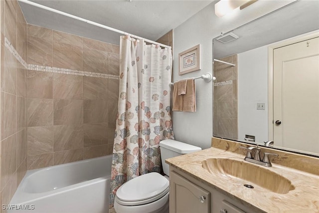 bathroom featuring toilet, shower / tub combo, visible vents, and vanity